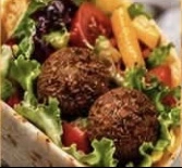 Falafel artwork from the supplied Daily Shawarma menu flyer, not a verified dish photograph